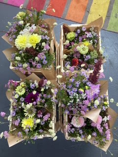 A collection of subscription delivery bunches waiting to be delivered
