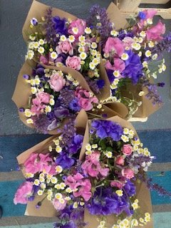 a collection of subscription delivery bunches waiting to be delivered