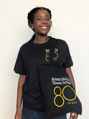 Student holding tote bag