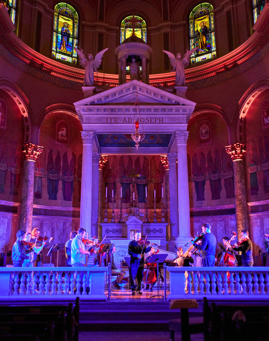 The Fort Greene Orchestra playing The Four Seasons at the altar of St. Joseph Co-Cathedral under the light design