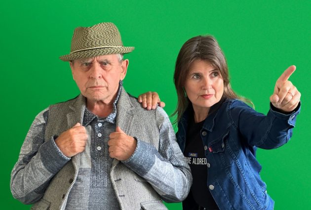 Sylvester McCoy (looking serious) and Sophie Aldred (pointing)