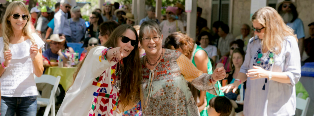 Four community members enjoy the Fiesta Arts Fair