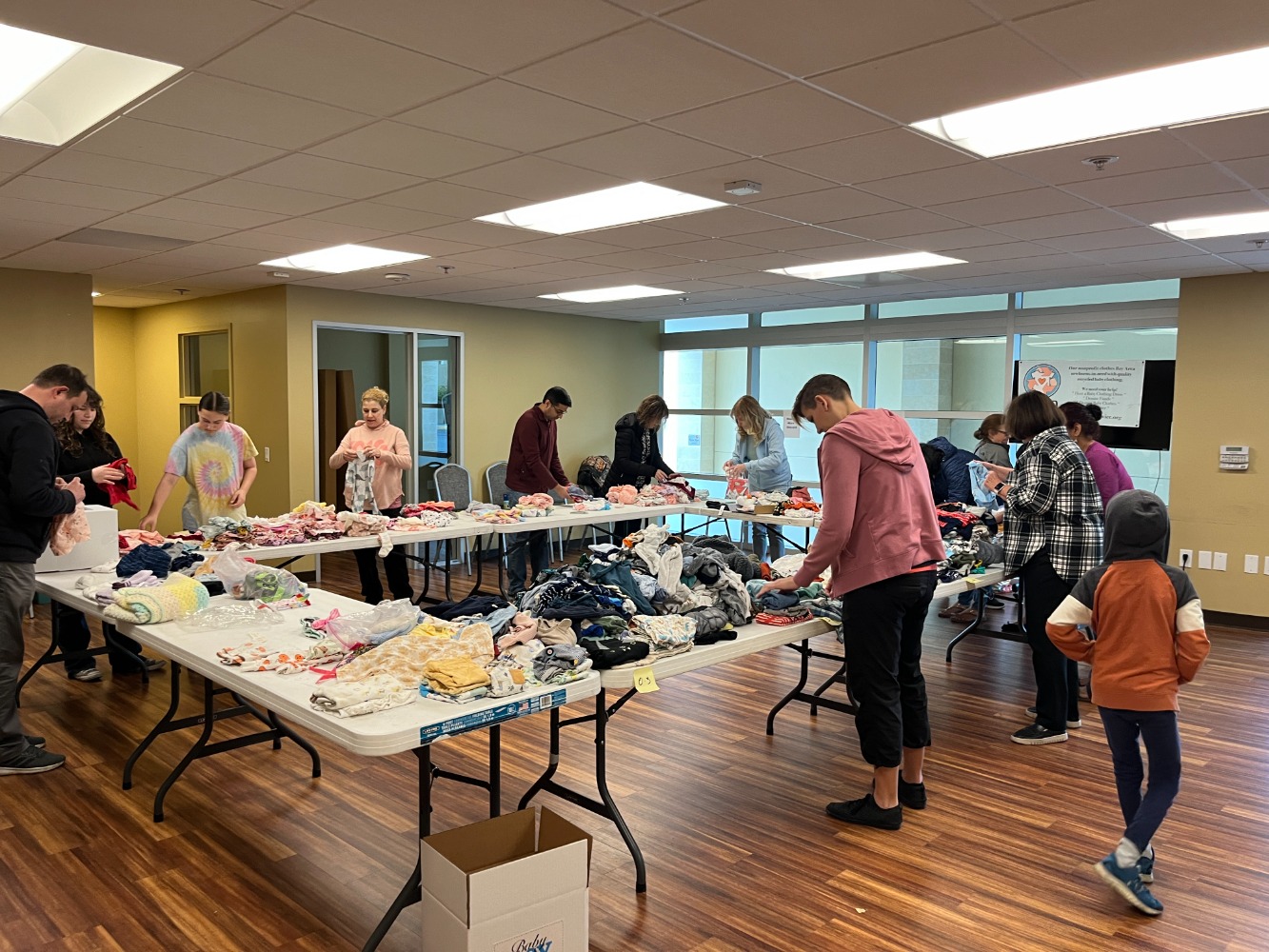 Small Threads Small Threads, Big Impact! Sort Baby Clothes for Loved Twice